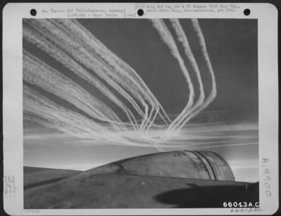 Thumbnail for Consolidated > Boeing B-17 Flying Fortresses Of The 381St Bomb Group En Route To Bomb Enemy Installations At Wilhelmshaven, Germany, 3 November 1943, Etch Fleecy Vapor Trails In The Sky.