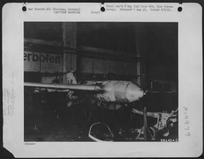 Thumbnail for Consolidated > German Me 163 Rocket Plane, Shown In Hangar At German Airfield In Poltzen, Germany, Near Leipzig, Which Was Overrun And Captured By Combat Command A, 9Th Armored Division, 1St Us Army.  Camouflaged Planes Were Found In Woods Around Airfield, But Most Of T