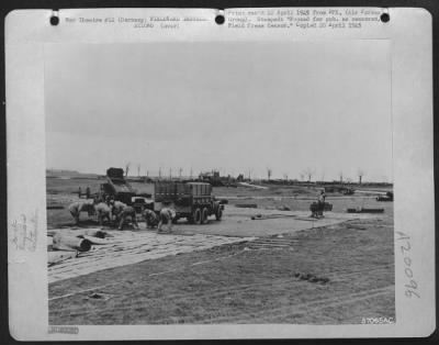 Thumbnail for Consolidated > Aviation Engineers Lay A Section Of New Airstrip, The First Allied Airfield In Germany For 9Th Af Fighter-Bombers Operating Ahead Of Us Ground Forces Advancing Into The Reich.  Removal Of Small Village And Several Wooded Sections, Unfavorable Weather Cond