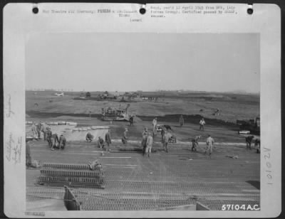 Thumbnail for Consolidated > Starting From Opposite Ends, Aviation Engineers Of The Ix Engineer Command Approach A Central Point Which Will Mark The Completion Of The Runway At A Fighter-Bomber Airstrip In Germany.  Shortly After This Photograph Was Made, A Republic P-47 Thunderbolts