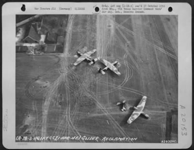 Consolidated > Glider Reclamation -- Two Weeks Time Was All That The 82Nd Service Group, 9Th Troop Carrier Command, Engineers Required To Place 60% Of The 1300 Gliders In Flyable Condition After The Rees-Wesel Airborne Division.  Shown Here Are British Horsa Gliders Wai