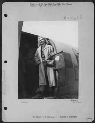 Consolidated > Germany -- From The Door Of A Douglas C-47 Transport Which Wil Return Her To Her Native Country This Attractice, Young Russian Girl, Until Recently A Slave Laborer For Germans, Smiles Appreciatively To Friendly (And Admiring) 9Th Af Service Command Mainte