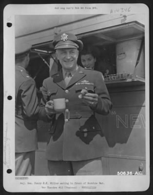 Thumbnail for Consolidated > Maj. Gen. Henry J.F. Miller eating in front of Service Bar.