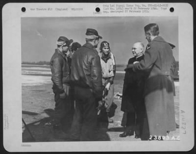 Thumbnail for Consolidated > Archbishop Francis J. Spellman and 1st Lt. Hunt, Catholic Chaplain, talk to Capt. Oscar O'Neill of Rio de Janeiro and members of the crew of the Boeing B-17"HELLZADROPPIN"at the 91st Bomb Group base at Bassingbourne, England before take