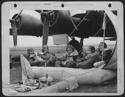 Consolidated > Five men in a Dingy.Left to Right: 1st Lt. Rockwell Rasmussen, Red Top, Minn., T/Sgt. Rollie Hill of Leroy, W.Va., 2nd Lt. Lloyd H. Keller of Greenville, Pa., S/Sgt. Price Dougherty of Winchester, Ky., and S/Sgt. Leland Fleming of Woodward, Okla.