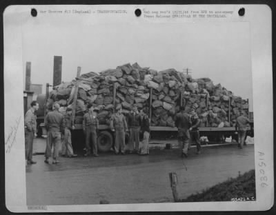 Consolidated > Here's why Technician Fifth Grade Dominick J. Palumbo, of 1345 Commonwealth Ave., New York, N.Y., Army Mail clerk with the 20th Fighter Group in England, says he's started counting mail bags in his sleep. Scenes like this are daily occurrences