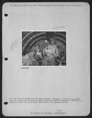 Thumbnail for Consolidated > "YOU ARE ABOUT TO EMBARK uponN THE GREAT CRUSADE." Messages of cheer and good luck from Gen. Eisenhower are given to paratroopers just prior to take-off. Paratroopers landed in France five hours before dawn assault by amphibious forces.