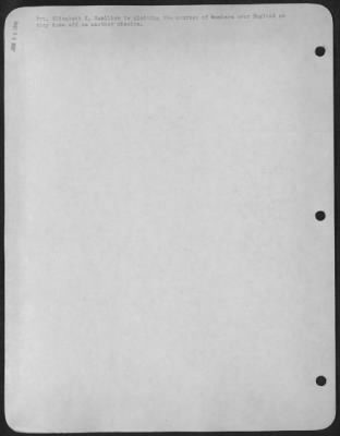 Consolidated > Pvt. Elizabeth K. Hamilton is plotting the courses of bombers over England as they take off on another mission.