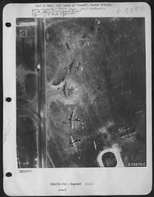 Thumbnail for Consolidated > Scene of explosion shows position of the planes which were destroyed (numbered) & some of the 11 other Boeing B-17 airplanes which were damaged. Plane 1 was blown to bits.