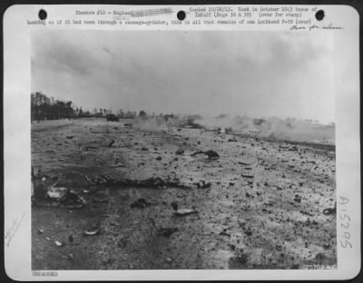 Thumbnail for Consolidated > Looking as if it had been through a sausage-grinder, this is all that remains of one Lockheed P-38. Just before this picture was taken, the pilot was buzzing the field at an English air base in violation of all rules. He got away with it safely once.