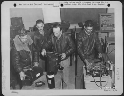 Thumbnail for Consolidated > Cameramen In The Photographic Section Of The 386Th Bomb Group Check K-20 Aerial Cameras At Great Dunmow, Essex, England, In Preparation For A Mission On 7 May 1944.