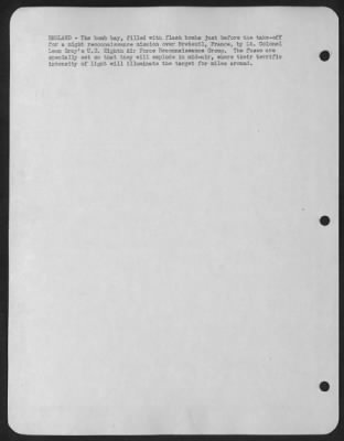 Consolidated > England - The Bomb Bay, Filled With Flash Bombs Just Before The Take-Off For A Night Reconnaissance Mission Over Breteuil, France, By Lt. Colonel Leon Gray'S U.S. 8Th Air Force Reconnaissance Group.  The Fuses Are Specially Set So That They Will Explode I