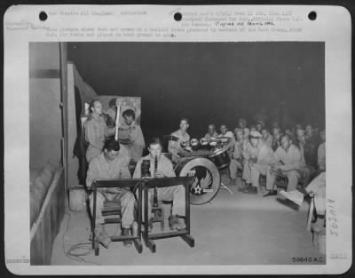 Thumbnail for Consolidated > This Picture Shows Cast And Crowd At A Musical Review Produced By Members Of The Bomb Group, 9Th U.S. Air Force And Played To Bomb Groups In Area.