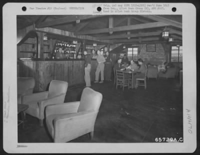 Thumbnail for Consolidated > Officers Of The 401St Bomb Group Relax In The Lounge Of The Officers' Club At An 8Th Air Force Base Near Deenethorpe, England.  November 1944.