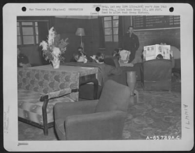 Thumbnail for Consolidated > Officers Of The 401St Bomb Group Relax In The Lounge Of The Officers' Club At An 8Th Air Force Base Near Deenethorpe, England.  November 1944.