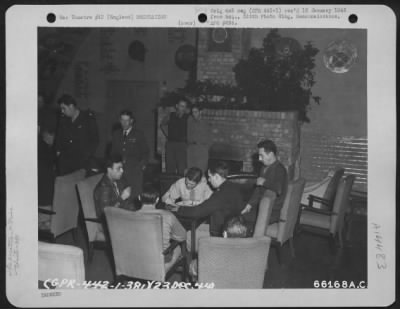 Thumbnail for Consolidated > Officers Of The 381St Bomb Group Relax In The Lounge Of Their Club.  England, 23 December 1944.