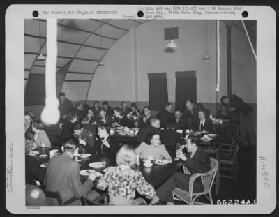 Consolidated > Officers Of The 381St Bomb Group Forget The Daily Routine As They And Their Guests Enjoy Themselves At A Party On 26 August 1943.  England.