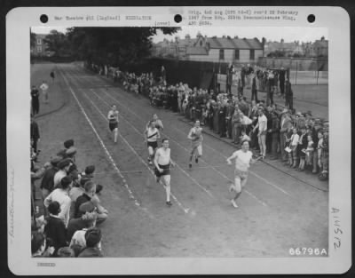 Thumbnail for Consolidated > Men Of The 8Th Bomb Comand Race For The Finish During A Track Meet Held In England, 7 July 1944.