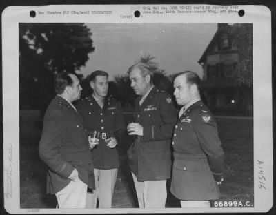 Thumbnail for Consolidated > The Guest List At A Party Given By Gen. James H. Doolittle In 1944 At Viii Bomber Command Headquarters, England, Included Brig. Gen. Arthur W. Vanaman (Left) And Brig. General Orvil A. Anderson (Right, Center).  The Other Two Officers Are Unidentified.