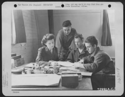 Thumbnail for Consolidated > Gis Of The 410Th Bomb Group Confer With Miss Frank Of The American Red Cross At One Of The Many Clubs In England.  9 August 1944.