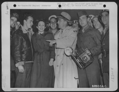 Thumbnail for Consolidated > Gis, Mps And A Photographer Surround Bing Crosby And A Member Of His Uso Troupe Who Arrived At The 353Rd Fighter Group Base In England On 15 October 1944.