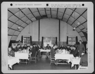 Thumbnail for Consolidated > Visiting Congressmen Are Guests At The Officers' Mess During A Congressional Tour Of Hdq., 1St Bomb Division, Based In England, On 2 August 1943.