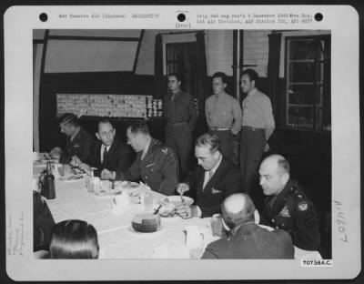 Thumbnail for Consolidated > Visiting Congressmen Are Guests At The Generals' Mess During A Visit To Hdq., 1St Bomb Division, Based In England, On 2 August 1943.  The Generals Are, Left To Right: Lt. General Jacob Devers, Brig. Gen. Robert B. Williams And Major General Ira C. Eaker.