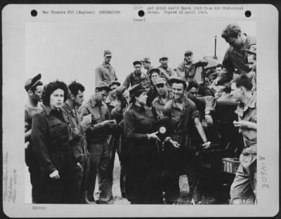 Thumbnail for Consolidated > Red Cross Workers Set Up A Portable Phonograph To Entertain Men Of The 445Th Bomb Group At An 8Th Air Force Base In England.