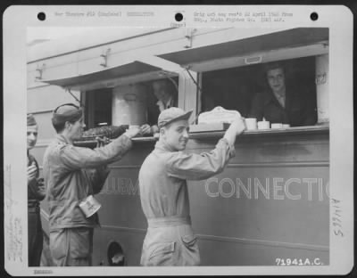 Thumbnail for Consolidated > Gis Of The 364Th Fighter Group, 67Th Fighter Wing, Are Served Doughnuts And Coffee From An American Red Cross Clubmobile At Their 8Th Air Force Station F-375, Honnington, England.  20 July 1944.