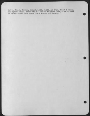 Thumbnail for Consolidated > 2Nd Lt. John A. Moeller, Oakland, Calif (Left) And S/Sgt. Robert S. Elroy, Los Angeles, Calif., Debate Who Will Use The Telephone First, At An Air Base In England, After Their Return From A Mission Over Germany.