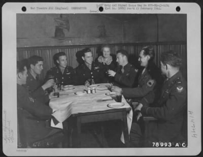 Consolidated > These Crew Members Of The Consolidated B-24 "Shoot Luke" Which Has Had 27 Missions Over Enemy Territory, Enjoy Refreshments In London, England After A Broadcast To The States.  They Are, Left To Right, Sgt. George W. Foster Of Akron, Ohio, Waist Gunner; T