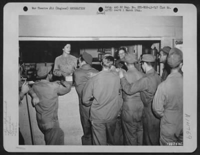 Thumbnail for Consolidated > Pvt. Dorothy Grossman Of Brooklyn, N.Y. And Pvt. Rosetta E. Arnold Of Mount Rose, Pa., Both Wacs Attached To The 12Th Replacement Control Depot At Ston, England, Serve Refreshments To Airmen At The Post Exchange.  30 July 1943.