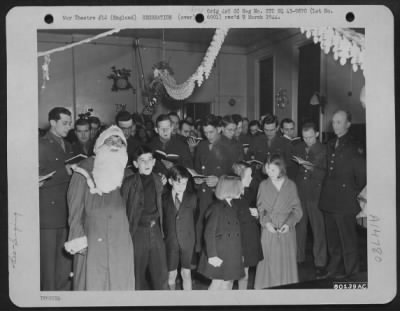 Thumbnail for Consolidated > Officers And Enlisted Men Of The U.S. Air Force Join The Child Patients Of The Royal Victoria Hospital At Bournemouth, England In Singing Christmas Carols During A Party Given By The Gis On 24 December 1943.