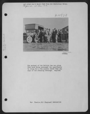 Consolidated > The Arrival Of British Tea Van Gives 93Rd Bomb Group Personnel The Opportunity To Relax For A Few Minutes While They Sip Cups Of The Steaming Beverage.  England.