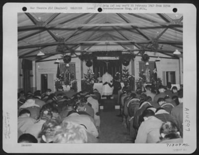 Consolidated > Religious Services Held A Christmas Time For Members Of The 379Th Bomb Group At An 8Th Air Force Base In England.  24 December 1944.