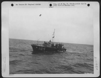 Thumbnail for Consolidated > Little Vessel Of Mercy, Number 184, Of The Air Sea Rescue Service In The North Sea, Comes Alongside Two Rubber Dinghies Holding Air Crew Members Of A B-17 Which Was Forced Down On Its Return To Its Base In England From Occupied Territory.  20 August 1943.