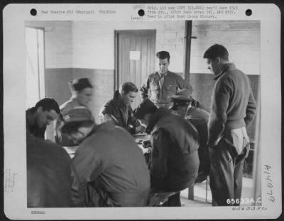 Thumbnail for Consolidated > 2Nd Lt. Leslye Winchester Supervises Radio Operators Of The 401St Bomb Group In Their Practice In Receiving And Transmitting Messages.  Only Those Who Proved Themselves Able To Log The Messages Accurately Were Eligible For Combat Flying.  England, 25 Febr