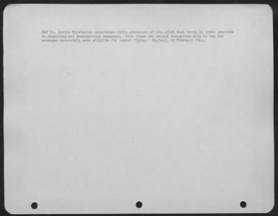 Thumbnail for Consolidated > 2Nd Lt. Leslye Winchester Supervises Radio Operators Of The 401St Bomb Group In Their Practice In Receiving And Transmitting Messages.  Only Those Who Proved Themselves Able To Log The Messages Accurately Were Eligible For Combat Flying.  England, 25 Febr