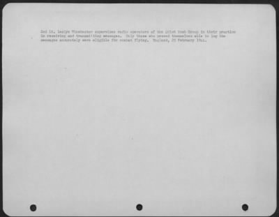 Thumbnail for Consolidated > 2Nd Lt. Leslye Winchester Supervises Radio Operators Of The 401St Bomb Group In Their Practice In Receiving And Transmitting Messages.  Only Those Who Proved Themselves Able To Log The Messages Accurately Were Eligible For Combat Flying.  England, 25 Febr