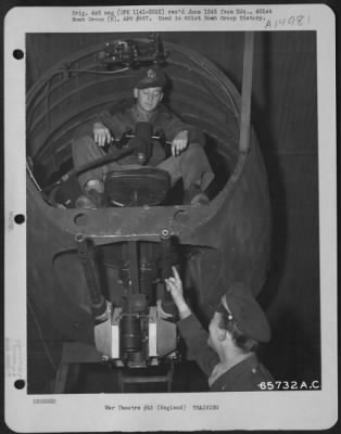 Thumbnail for Consolidated > Gunnery Instruction At The 401St Bomb Group Base Was Constant And Careful.  Here, 1St Lt. Robert J. King, A Navigator, Is Instructed In The Use Of The Chin Turret By T/Sgt. Bert B. Bessellieu.  England, 25 October 1944.