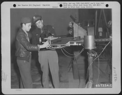 Thumbnail for Consolidated > Gunnery Instruction At The 401St Bomb Group Base Was Constant And Careful.  Here, S/Sgt. R.D. Machietto And Lt. T.H. Holland Work With A .50 Cal. Machine Gun.  England, 25 October 1944.