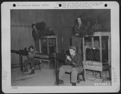 Thumbnail for Consolidated > Gunnery Instruction At The 401St Bomb Group Base Was Constant And Careful.  S/Sgt. E.A. Sokolowski And S/Sgt. A.P. Machasick Get Some Gunnery Practice By Using An Aerial Gunnery Trainer, Designed To Teach All Phases Of Aerial Flexible Gunnery Without Any