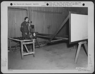 Thumbnail for Consolidated > Gunnery Instruction At The 401St Bomb Group Base Was Constant And Careful.  S/Sgt. Brauer Operates The Shadowgraph, A Device To Project On A Screen, The Shadow Of An Aircraft Plastic Model.  England, 25 October 1944.