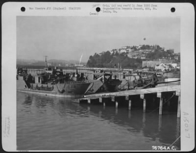 Thumbnail for Consolidated > Members Of The 834Th Engineer Aviation Battalion Load Equipment Aboard A Landing Craft During Amphibious Training At Torquay, England.