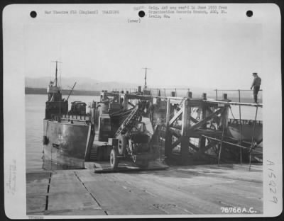 Thumbnail for Consolidated > Members Of The 834Th Engineer Aviation Battalion Load Equipment Aboard A Landing Craft During Amphibious Training At Torquay, England.