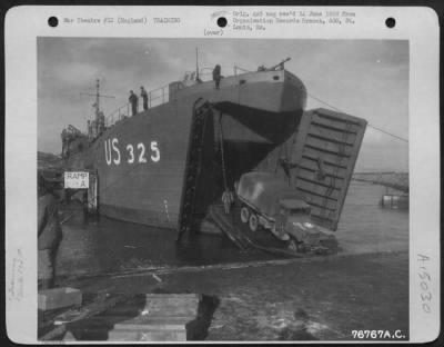 Thumbnail for Consolidated > Members Of The 834Th Engineer Aviation Battalion Load Equipment Aboard A Landing Craft During Amphibious Training At Torquay, England.