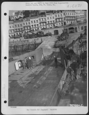 Thumbnail for Consolidated > Members Of The 834Th Engineer Aviation Battalion Load Equipment Aboard A Landing Craft During Amphibious Training At Torquay, England.