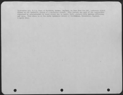 Consolidated > Instructor Cpl. F.J.G. Nunn Of Woolwich, London, England On Loan From The Raf, Instructs Allied Airmen On The Hydraulic System Of A Lancaster Bomber.  This Lecture Was Part Of The Instruction Organized By Manufacturers To Teach Airmen How To Handle Their
