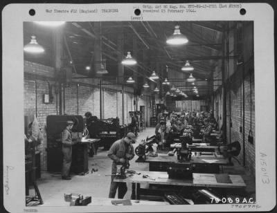 Thumbnail for Consolidated > Men Learn Practical Work On Sheet Metal In A Classroom Of A U.S. Technical Training School In Warton, Lancaster, England, 1 April 1943.  Most Of The Metal Used Is Salvaged From Flying Fortresses, And All The Machinery Is Made In The U.S.