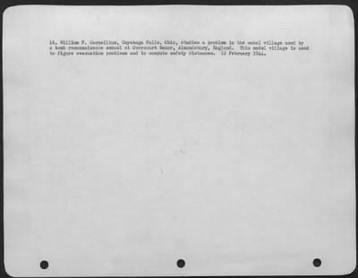 Thumbnail for Consolidated > Lt. William F. Corneilius, Cuyahoga Falls, Ohio, Studies A Problem In The Model Village Used By A Bomb Reconnaissance School At Overcourt Manor, Almondsbury, England.  This Model Village Is Used To Figure Evacuation Problems At To Compute Safety Distances